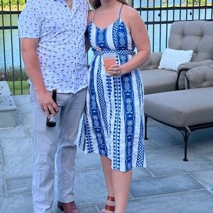 Size M blue and white embroidered dress. Cute cross back detail. Worn once